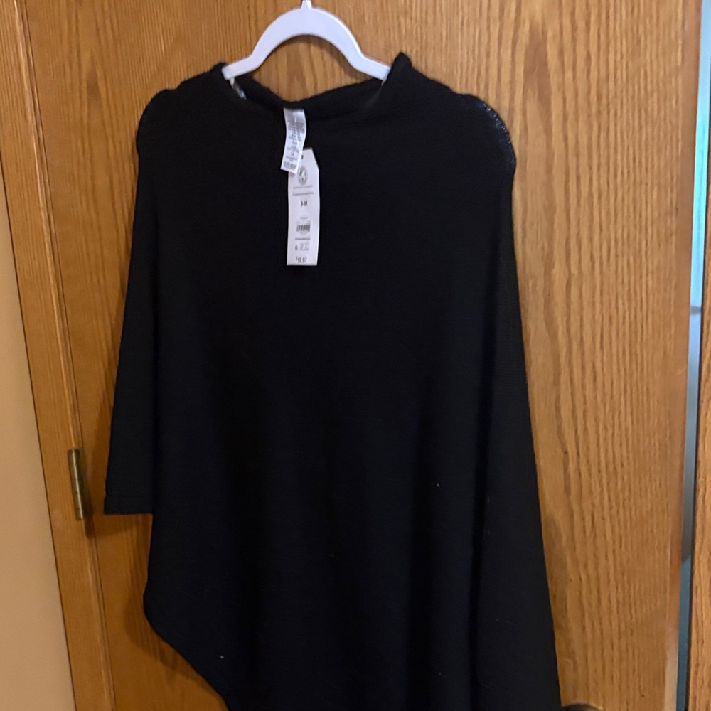 Time and tru  Black Poncho. New
Blue poncho .